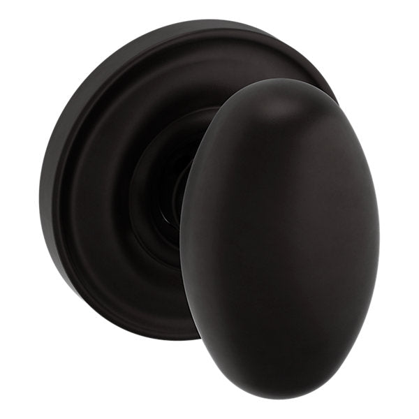 Baldwin Hardware Perilla 5025 con Roseta 5048 — Bronce aceitado — Paso
