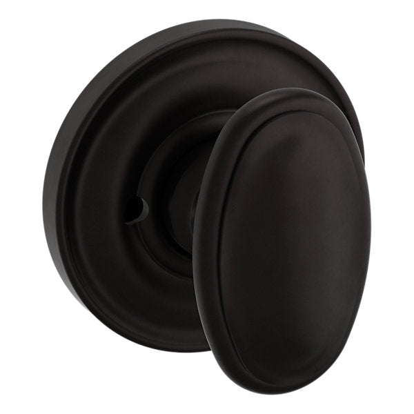 Baldwin Hardware Perilla 5057 con Roseta 5048 — Bronce aceitado — Privacidad