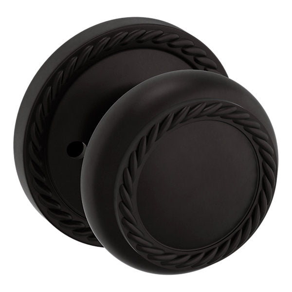 Baldwin Hardware Perilla 5064 con Roseta 5004 — Bronce aceitado — Privacidad