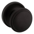Baldwin Hardware Perilla 5069 con Roseta 5076 — Bronce aceitado — Paso