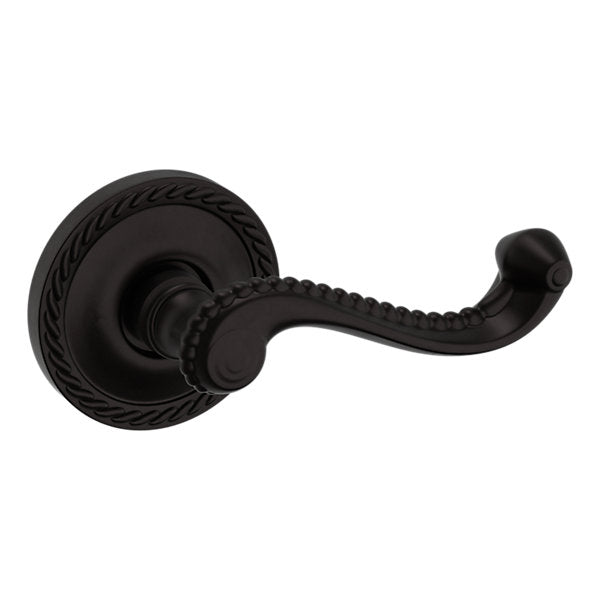 Baldwin Hardware Manija 5104 con Roseta 5004 — Bronce aceitado — Paso