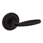 Baldwin Hardware Manija 5106 con Roseta 5048 — Bronce aceitado — Paso