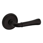 Baldwin Hardware Manija 5113 con Roseta 5078 — Bronce aceitado — Paso