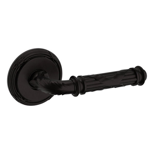 Baldwin Hardware Manija 5122 con Roseta 5022 — Bronce aceitado — Paso