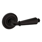 Baldwin Hardware Manija 5125 con Roseta 5048 — Bronce aceitado — Paso