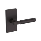 Baldwin Hardware Manija Reserve Riddling — Bronce veneciano — Contemporary 5 — Medio Dummy