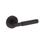 Baldwin Hardware Manija Reserve Riddling — Bronce veneciano — Contemporary Round — Paso