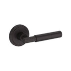 Baldwin Hardware Manija Reserve Riddling — Bronce veneciano — Stepped Round — Medio Dummy