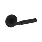Baldwin Hardware Manija Reserve Riddling — Negro satinado — Stepped Round — Medio Dummy