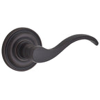 Baldwin Hardware Reserve Manija Curve — Bronce veneciano — Traditional Round — Paso