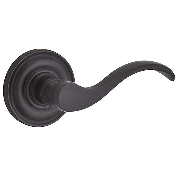 Baldwin Hardware Reserve Manija Curve — Bronce veneciano — Traditional Round — Paso