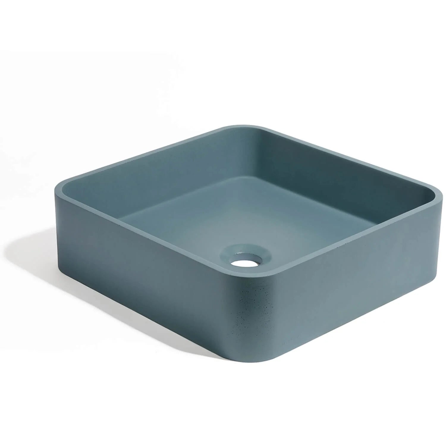 Lavabo de concreto cuadrado en color azul profundo