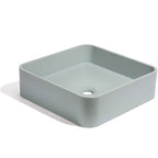 Lavabo de concreto cuadrado en color azul somero