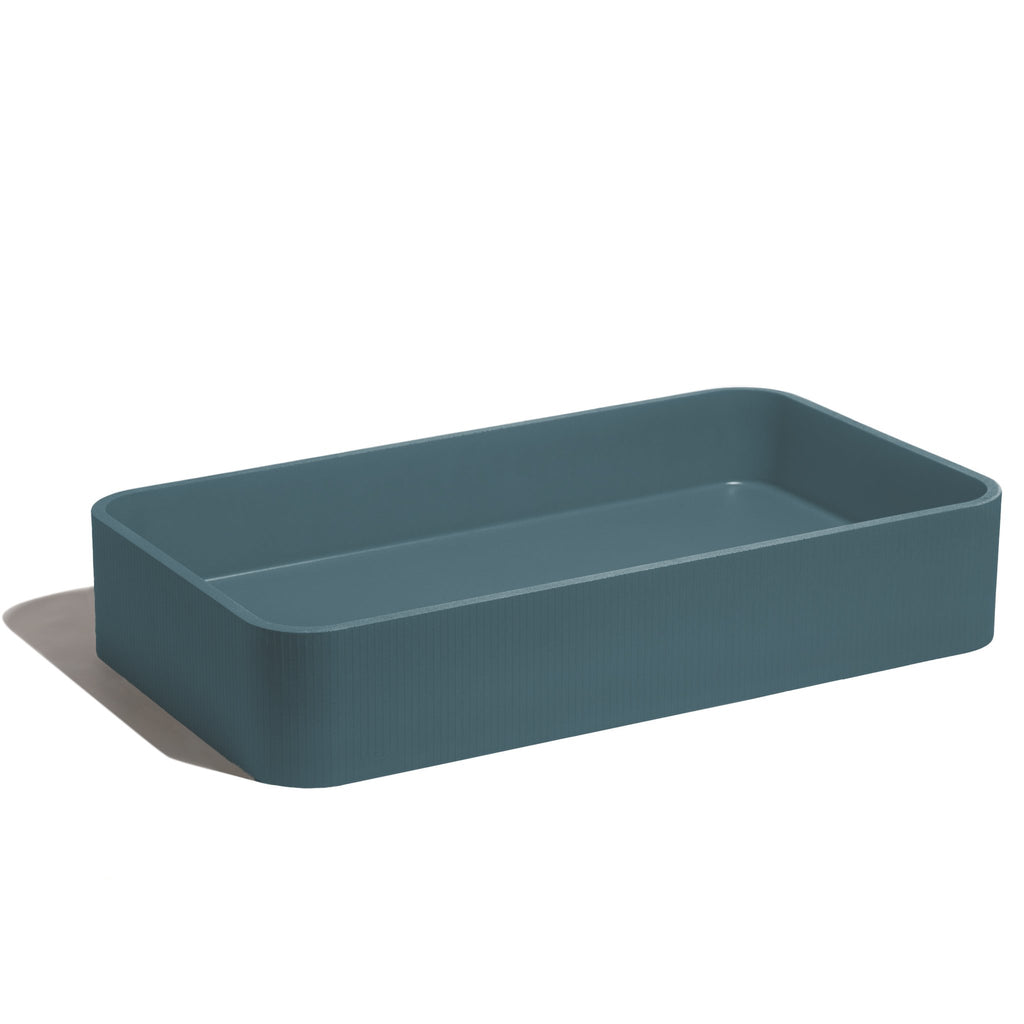 Lavabo de concreto rectangular marca Mistoa en color azul profundo