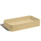 Lavabo de concreto rectangular marca Mistoa en color mostaza