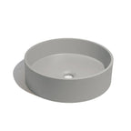 Lavabo de concreto circular en color gris