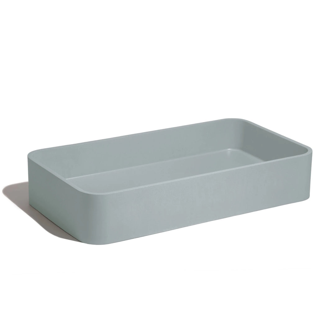 Lavabo de concreto rectangularmarca Mistoa en color azul somero