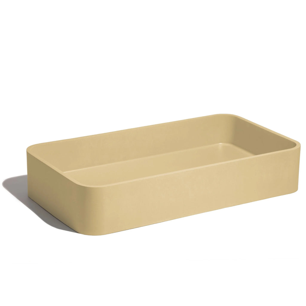 Lavabo de concreto rectangular marca Mistoa en color mostaza