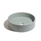 Lavabo de concreto circular marca Mistoa en color azul somero