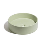 Lavabo de concreto circular marca Mistoa en color menta