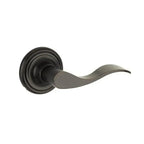 Yale Expressions Maguire rosette with Privacy Brunswick lever — Bronce Aceitado