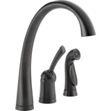Delta Pilar® Llave de una manija para cocina con rociador y tecnología Touch2O