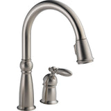 Delta Victorian™ Llave de una manija con tubo de salida deslizable para cocina