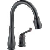Delta Leland® Llave de una manija con tubo de salida deslizable para cocina