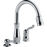 Delta Leland® Llave de una manija con tubo de salida deslizable para cocina con dispensador de jabón