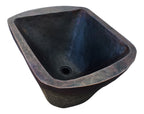 Lavabo de cobre sobre madera