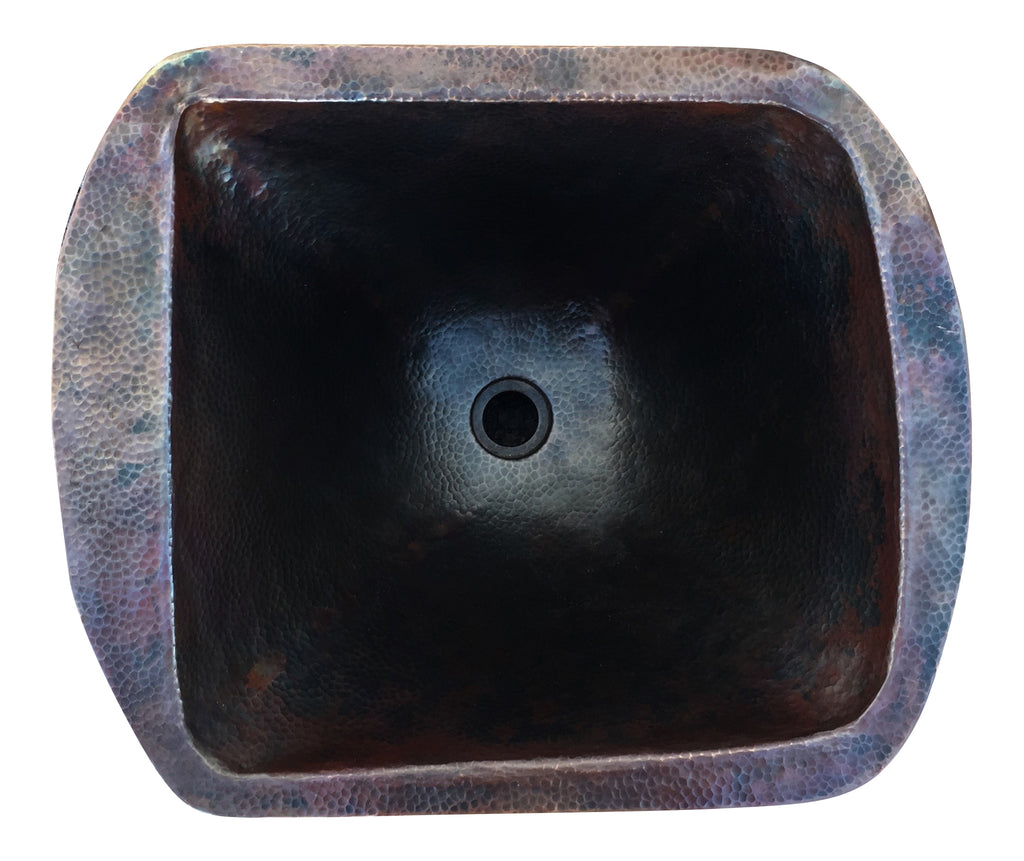 Lavabo de cobre sobre madera