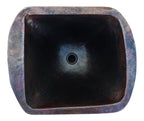 Lavabo de cobre sobre madera