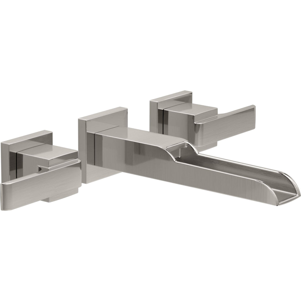 Delta Ara™ Llave de dos manijas de montaje en pared para lavamanos con tubo de salida de canaleta