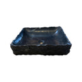 lavabo de marmol negro